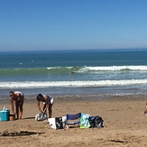 Small summer swell looking decent on the shorebreak, Carolles