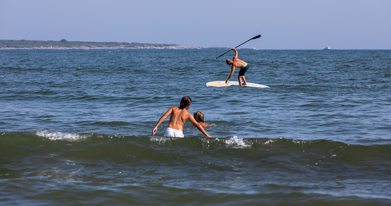 Paddleboarder falling off board at Second Beach, Sachuest Beach (2nd Beach)