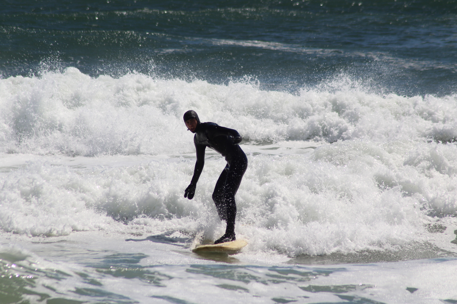 Punchy rough waves on a longboard, Salisbury Beach