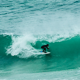 Surfer preparing for a sick barrel at Witsands!