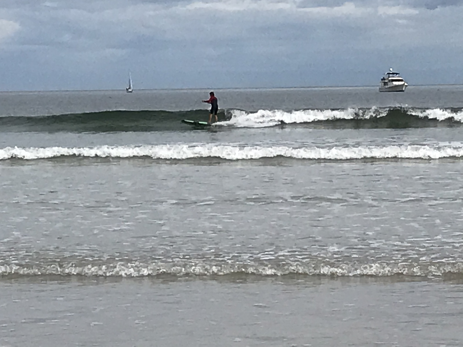 Surfing at North Haven Beach. Adelaide.