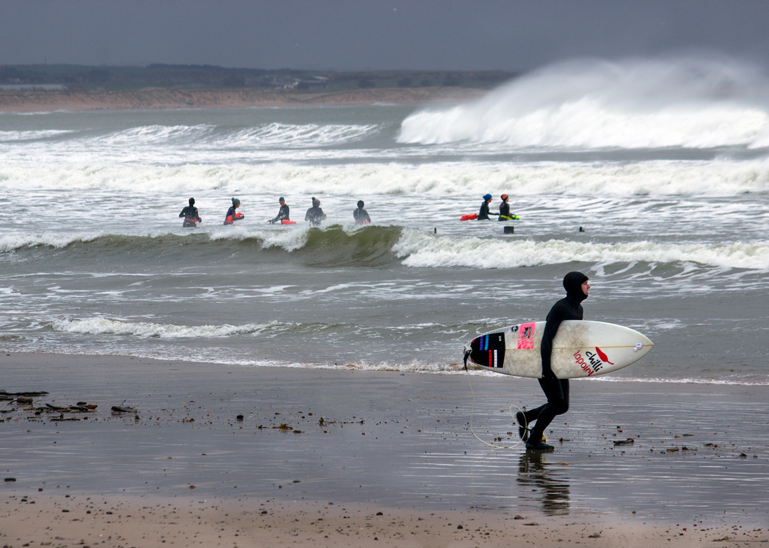 Surfer and wild swimmers, Aberdeen