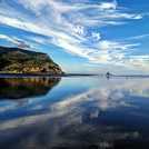 Glassy low tide, Karekare