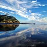 Glassy low tide, Karekare