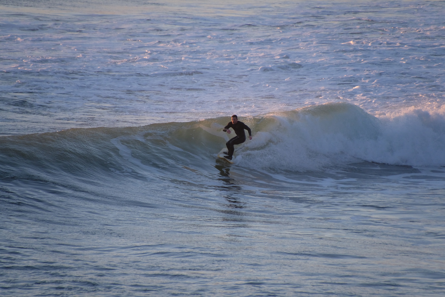 The second day of a small long period swell. A reef near Anatori., Anatori River