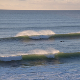 The second day of a small long period swell. A reef near Anatori., Anatori River