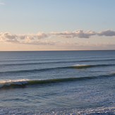 The second day of a small long period swell. A reef near Anatori., Anatori River