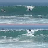 Surfers at jetty next to lifeguard tower 45, Gillis