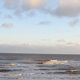 Autumn swell hits the sandbanks at Walbs, Walberswick