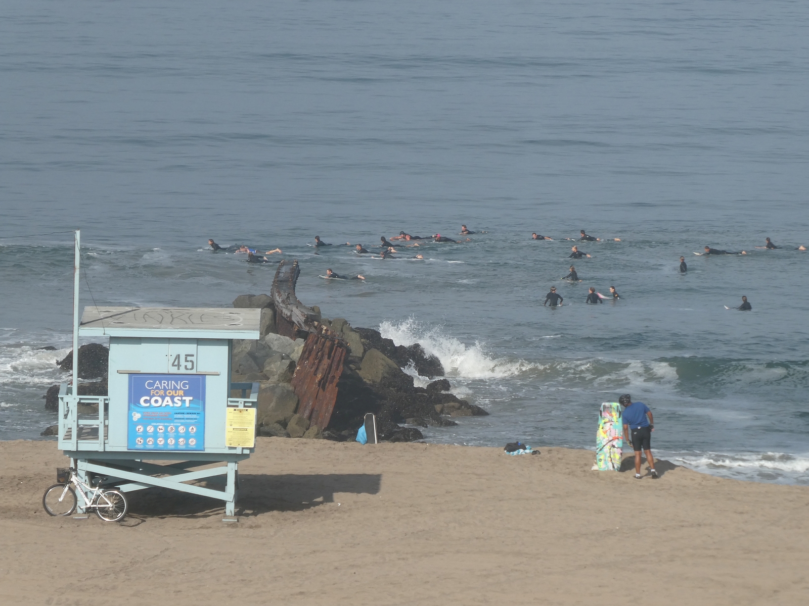 Twenty two surfers at Gillis break (lifeguard tower 45) one day after big surf
