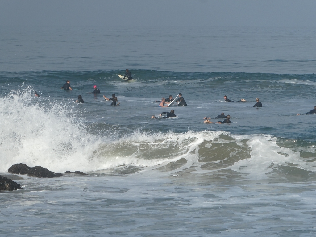Surfers waiting for a good wave at Gillis