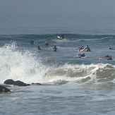 Surfers waiting for a good wave at Gillis