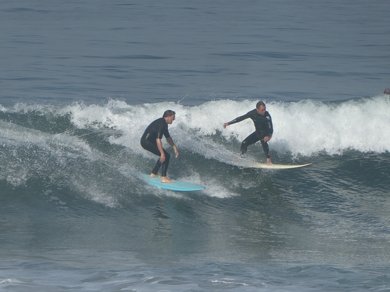 Two surfers coming in, Gillis
