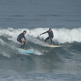 Two surfers coming in, Gillis