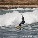 Malta Surf School, surf coach Valerio surfing a fun Riviera day, Ghajn Tuffieha