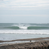 A-frame breaking with offshore blow-back, Lyall Bay