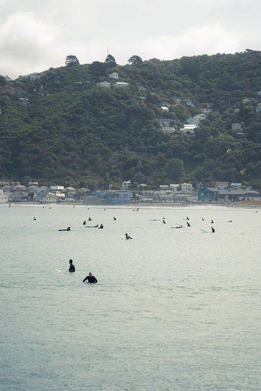 Summer waves = busy waves, Lyall Bay