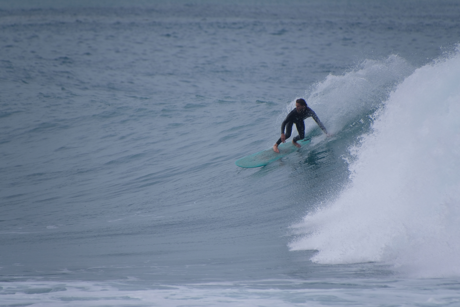 Surfing at Kahutara