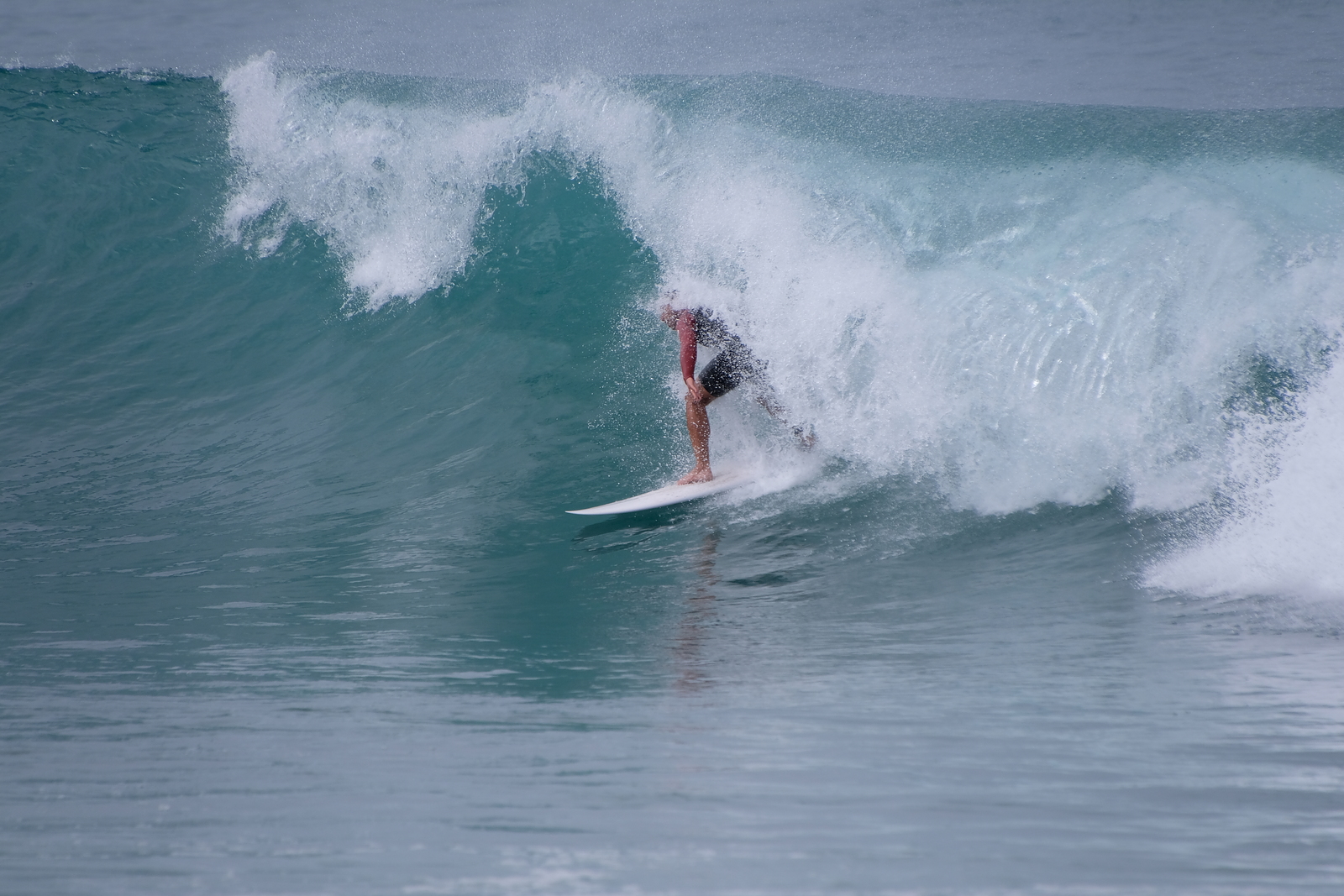 Surfing at Kahutara