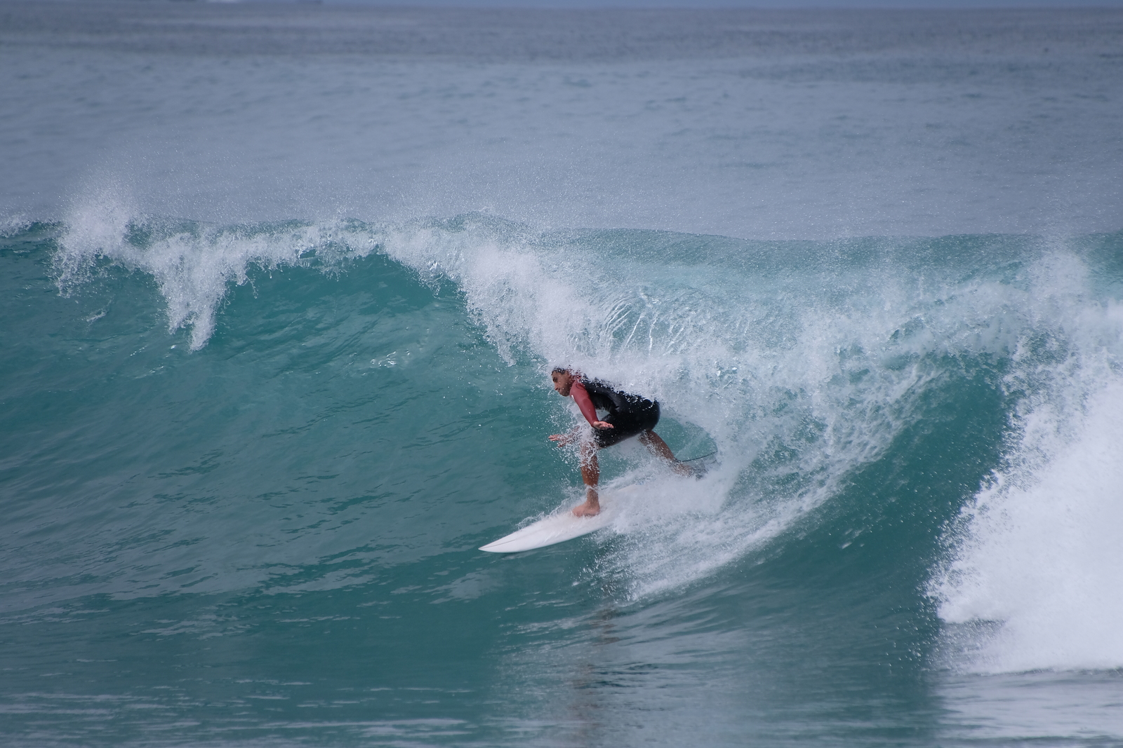 Surfing at Kahutara