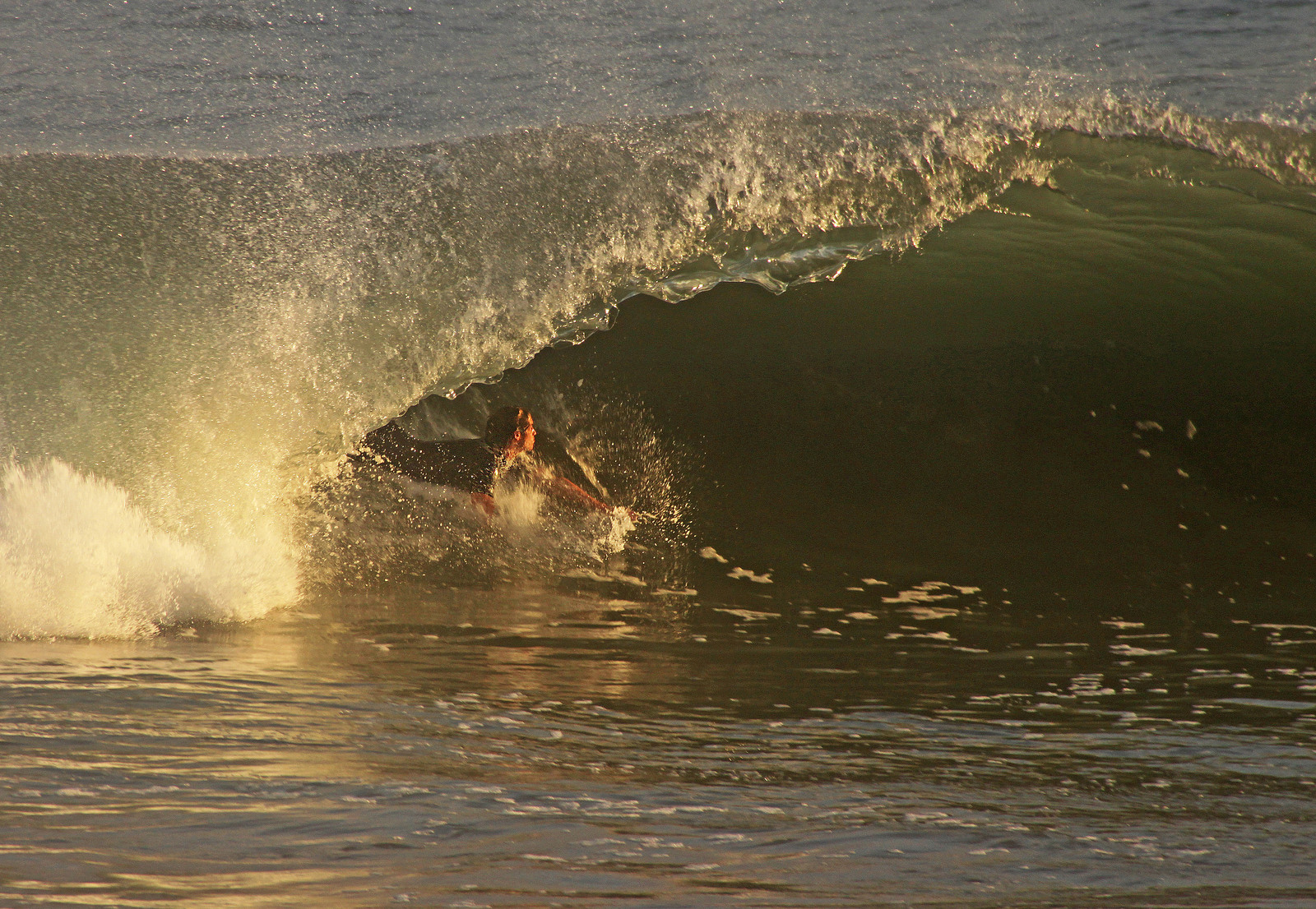 Riding in a tube, Newport Beach