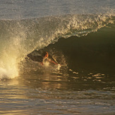 Riding in a tube, Newport Beach