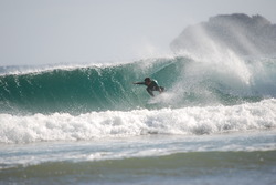 David agarrando el canto en Oriñon, Playa de Orinon photo