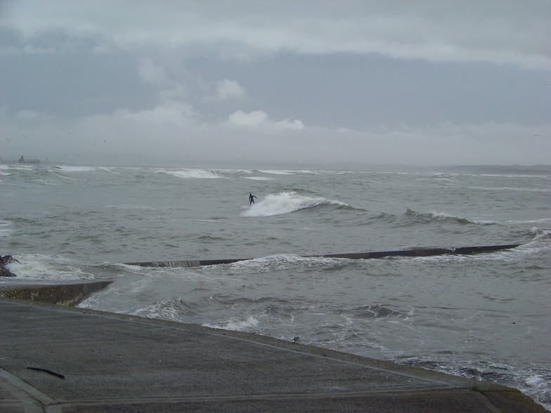 Surfing at Tramore Pier, first time seeing that!!!