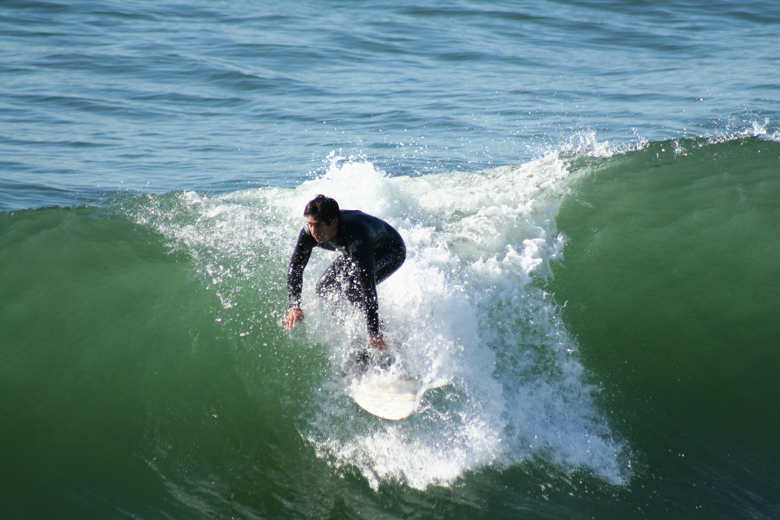 Surfing at Manhattan Beach Pier, Manhattan Beach and Pier