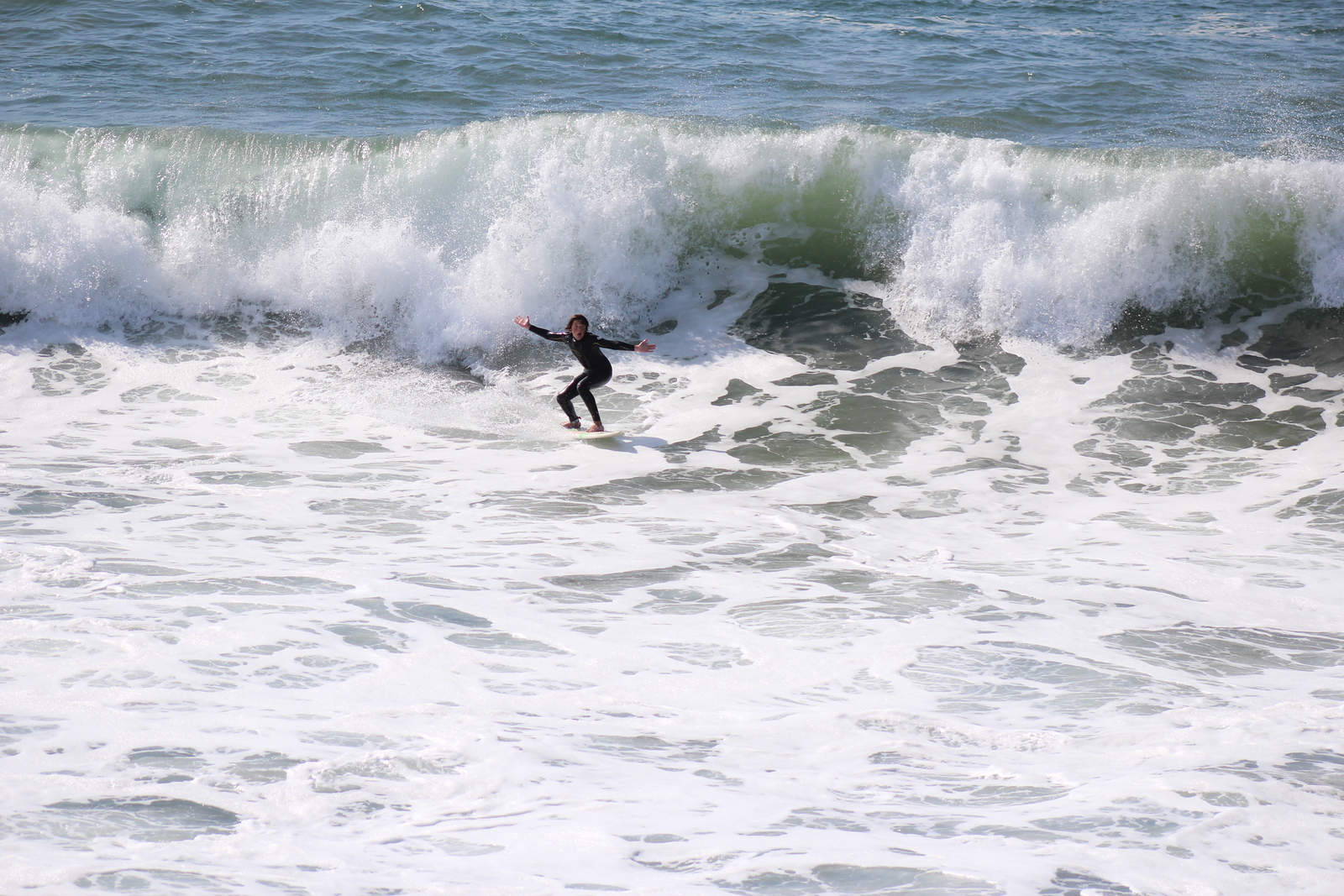 Surfing at Manhattan Beach Pier, Manhattan Beach and Pier