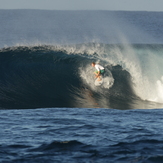 DANIEL MAWKES IN AN EARLY MORNING TUBE, Aganoa Beach