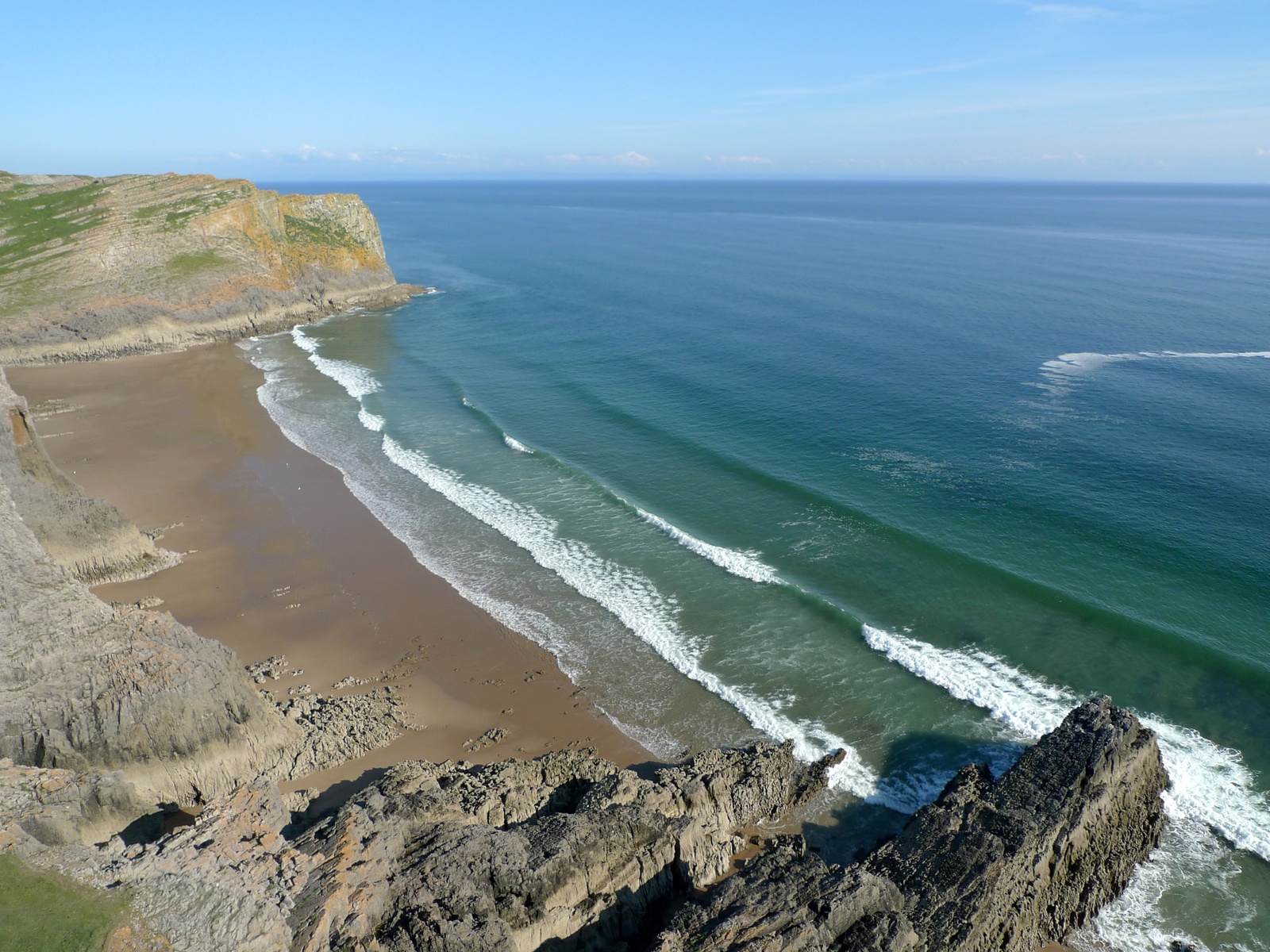 Tiny summer swell at Mewslade, Mewslade Bay