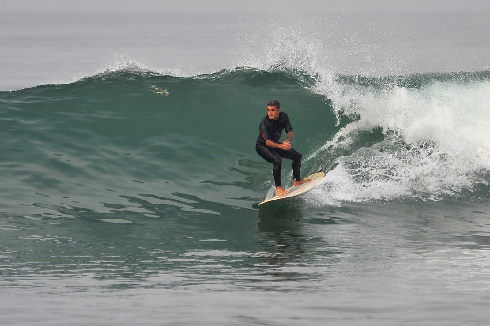 Backside on a glassy right, Burros