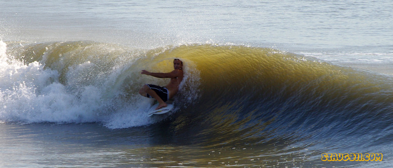 Laying back in the tube, St Augustine Beach Pier