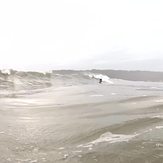 lou on a stormy one, Oxwich Bay