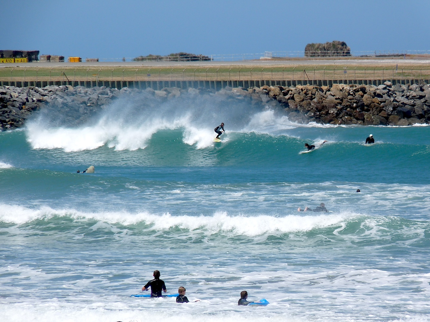 Summer crowd at the Wall, Lyall Bay