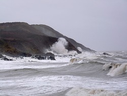 Storm surf at Langland Bay photo